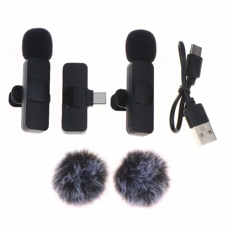Set of microphones with a USB cable and windshields on a white background