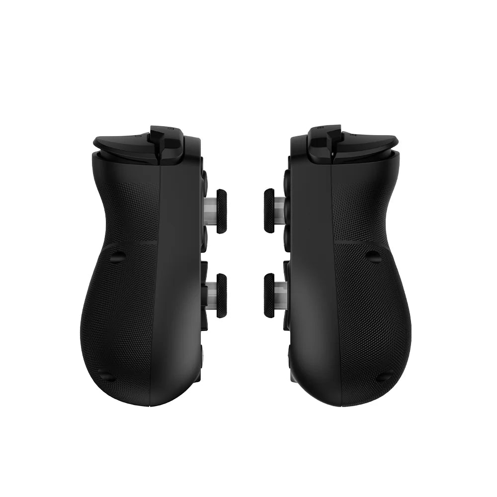 Pair of black gaming controllers on a white background